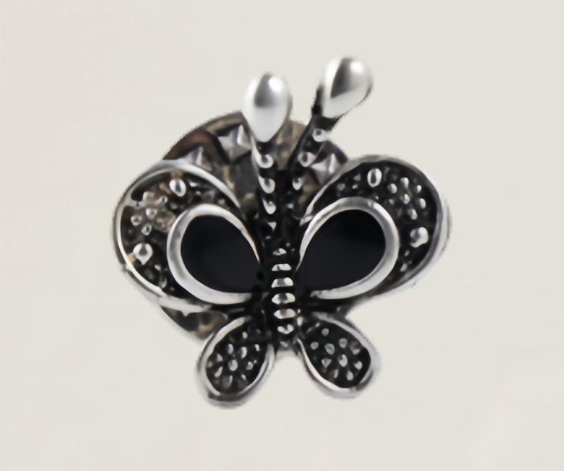 Antique butterfly badge